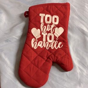 Red and white oven mitt
